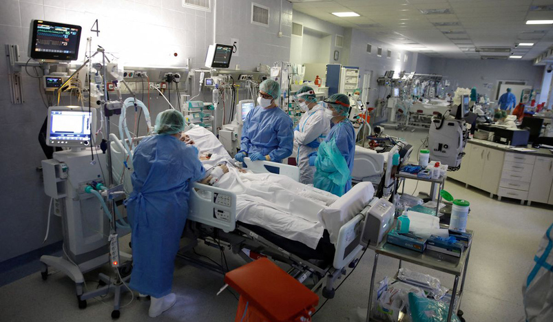 Medical staff members treat patients in Poland